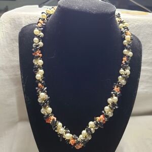 Beautiful coral, Hematite, faux pearls and gold beads necklace